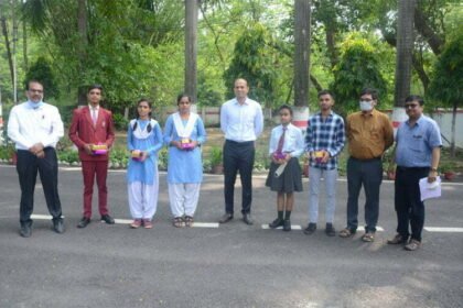 The collector gave the gift to the toppers of the district