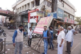 Corporation's action on road barrier: Hoardings and goods removed