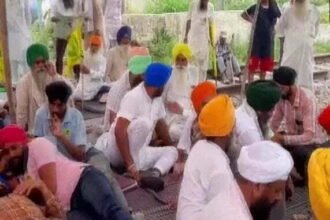 In Punjab, sugarcane farmers sitting on rail tracks, warned the government
