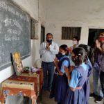 Teachers welcomed the children by applying tilak