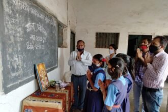 Teachers welcomed the children by applying tilak