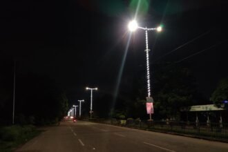 The main road of the township illuminated with colorful beautiful colorful lights