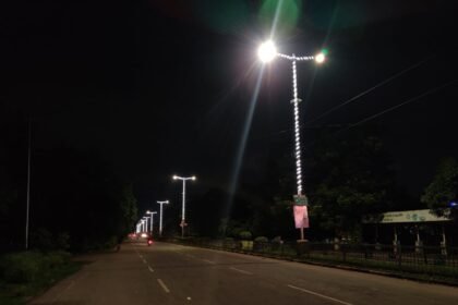 The main road of the township illuminated with colorful beautiful colorful lights