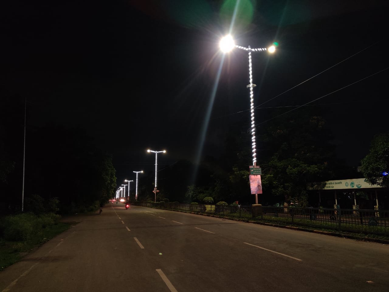 The main road of the township illuminated with colorful beautiful colorful lights