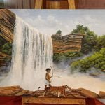 जनजातीय साहित्य महोत्सव के दौरान कैनवास और जमीन पर रंगों की कलाकारी